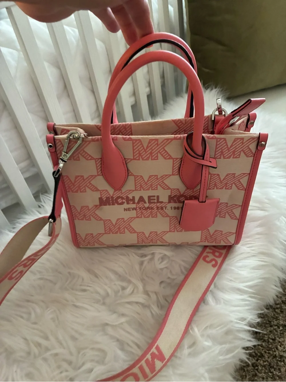 Michael Kors Mirella Small Logo Jacquard Crossbody Bag tea rose pink colorway.